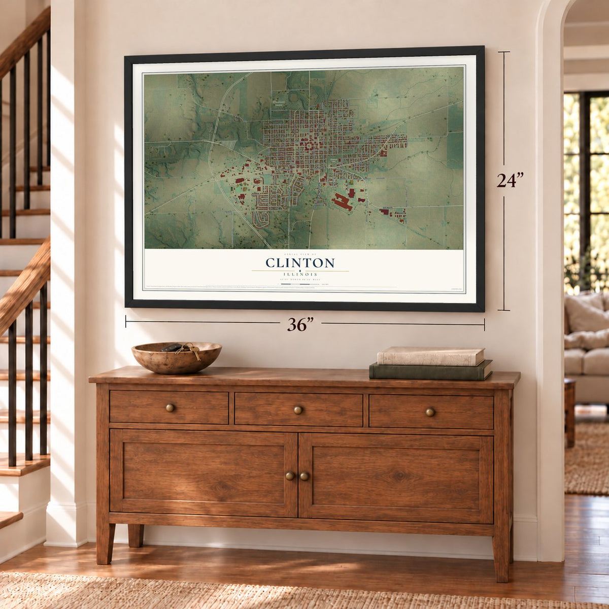 Clinton, Illinois map, 24 x 36 inch print in a black frame above a dresser by a staircase