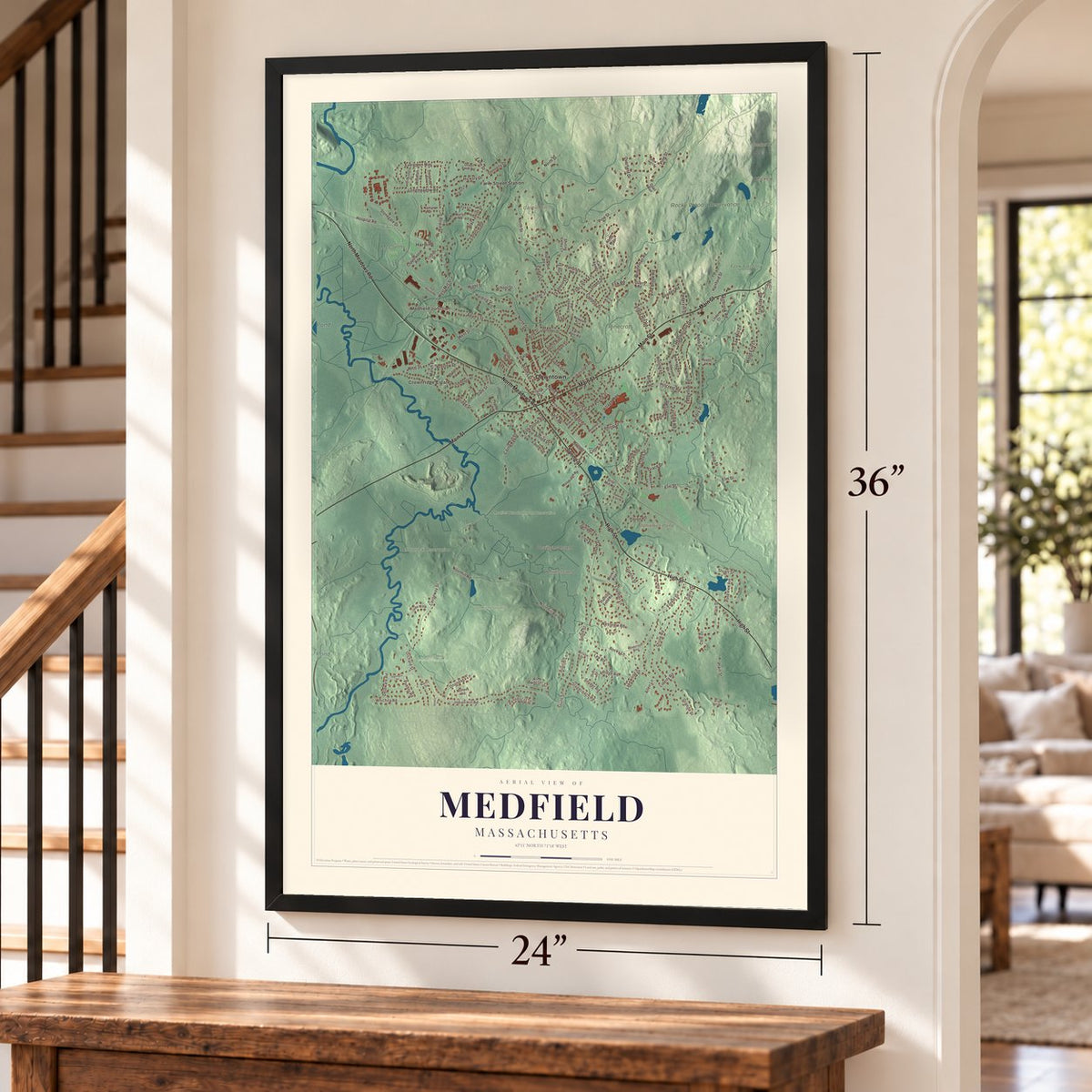 Medfield, Massachusetts map, 24 x 36 inch print in a black frame by a staircase