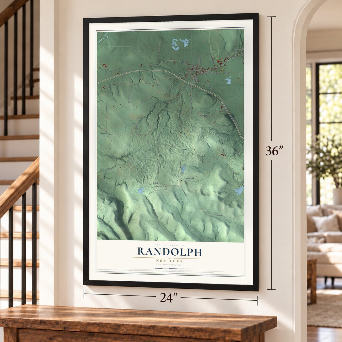 Randolph, New York map, 24 x 36 inch print in a black frame by a staircase