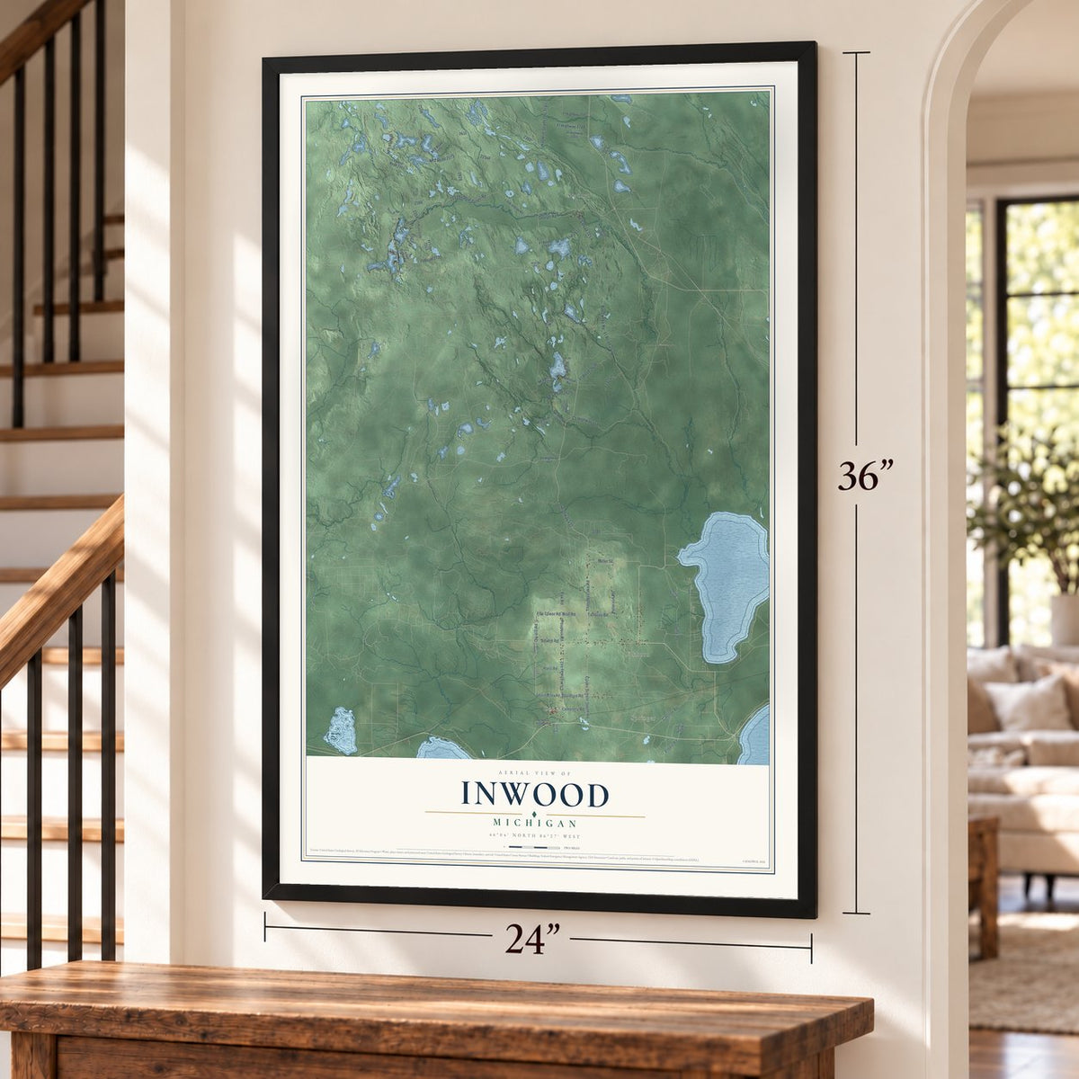 Inwood, Michigan map, 24 x 36 inch print in a black frame by a staircase