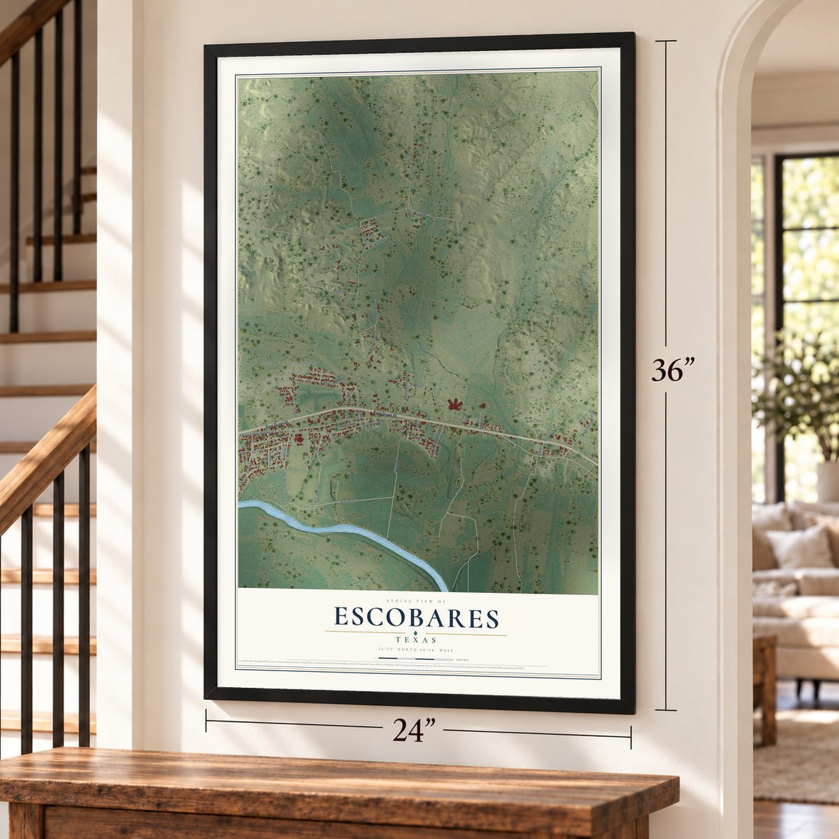 Escobares, Texas map, 24 x 36 inch print in a black frame by a staircase