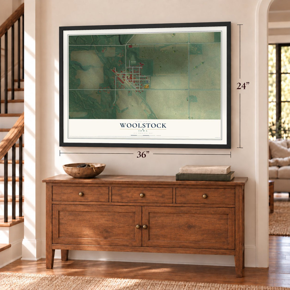 Woolstock, Iowa map, 24 x 36 inch print in a black frame above a dresser by a staircase