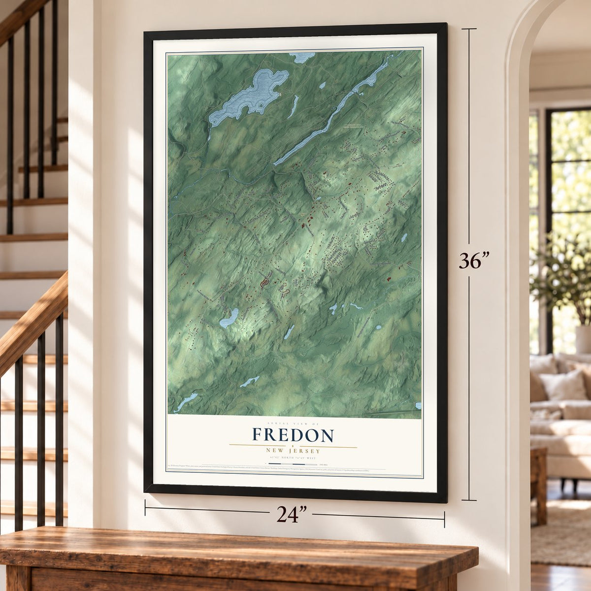 Fredon, New Jersey map, 24 x 36 inch print in a black frame by a staircase