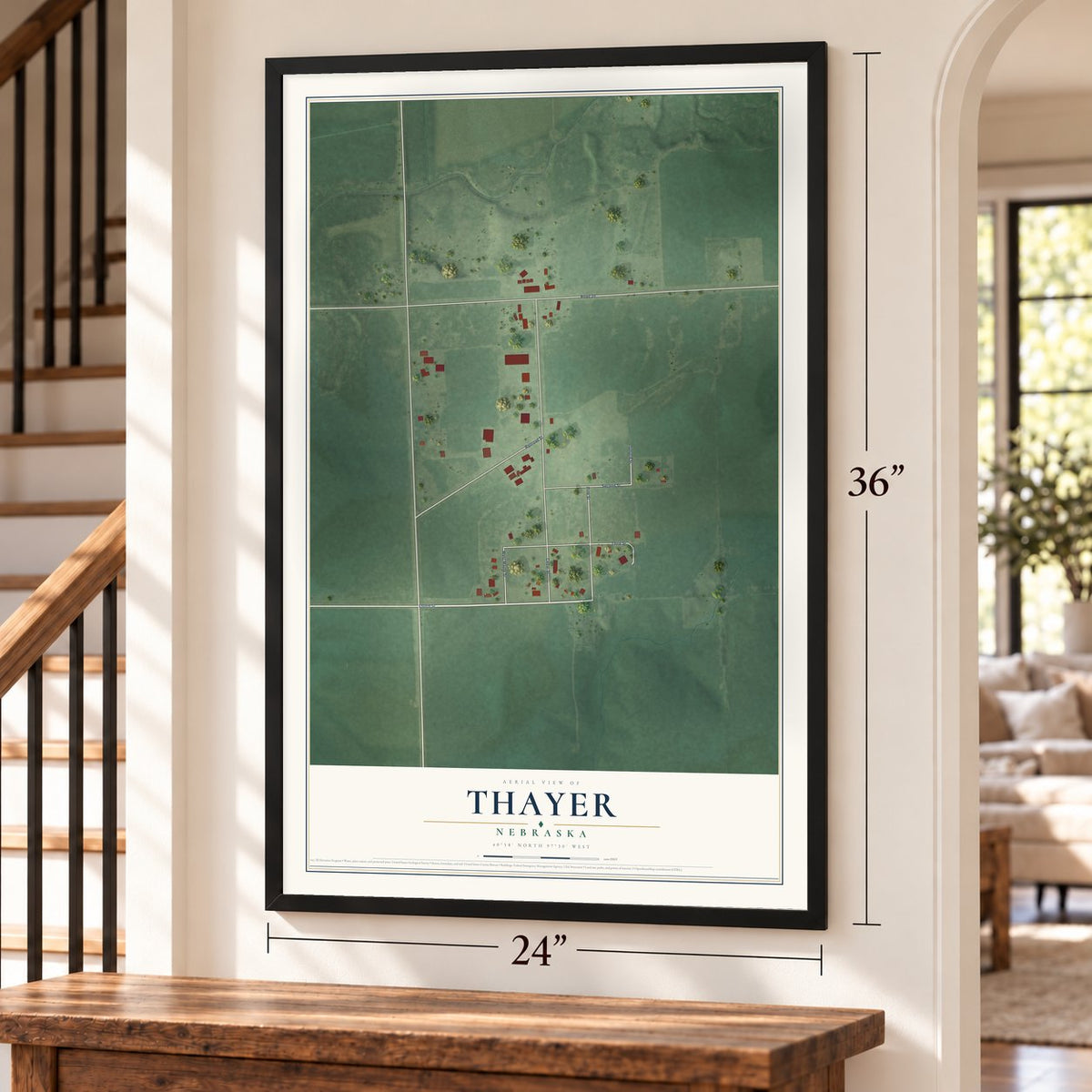 Thayer, Nebraska map, 24 x 36 inch print in a black frame by a staircase