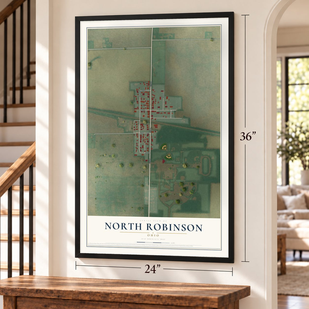 North Robinson, Ohio map, 24 x 36 inch print in a black frame by a staircase
