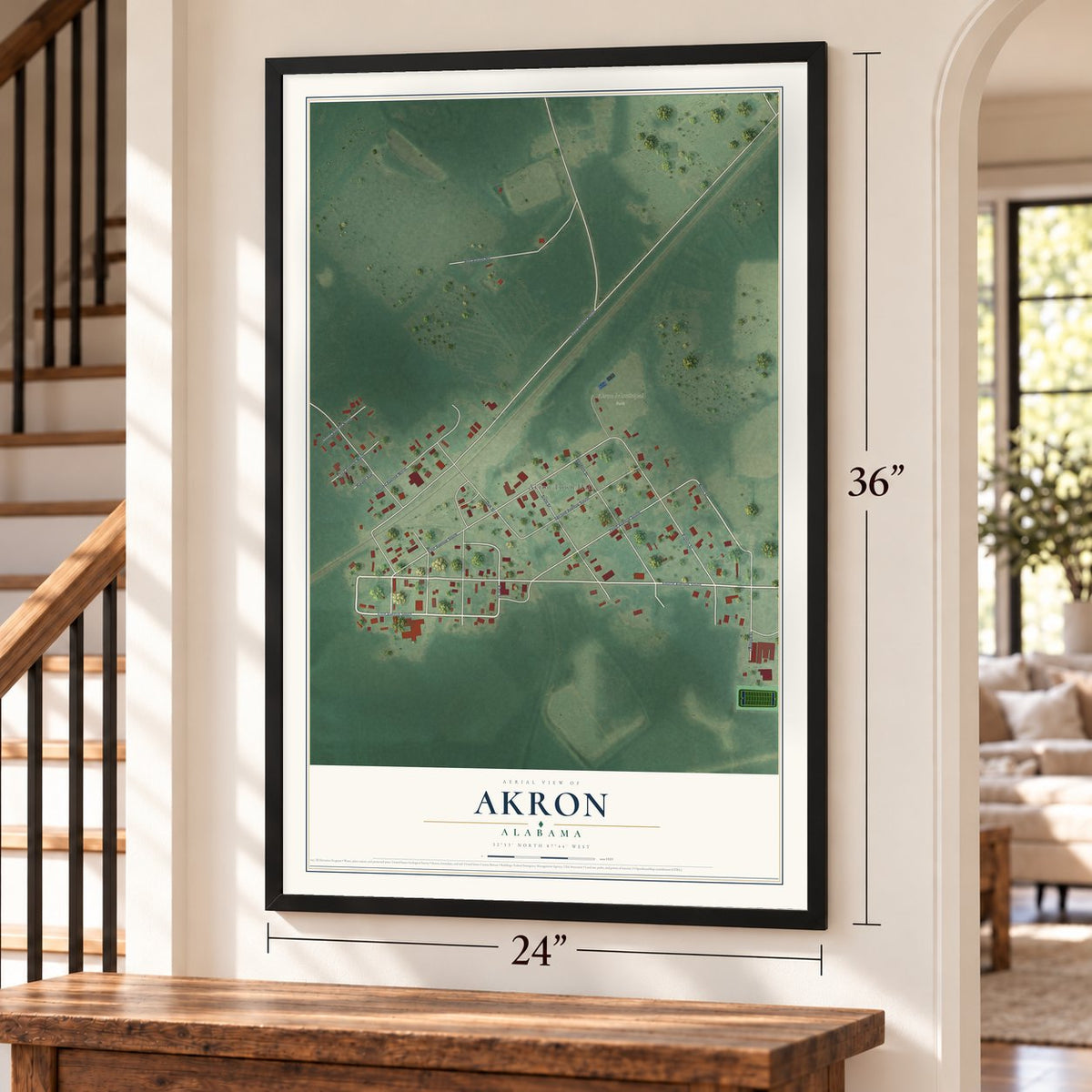 Akron, Alabama map, 24 x 36 inch print in a black frame by a staircase