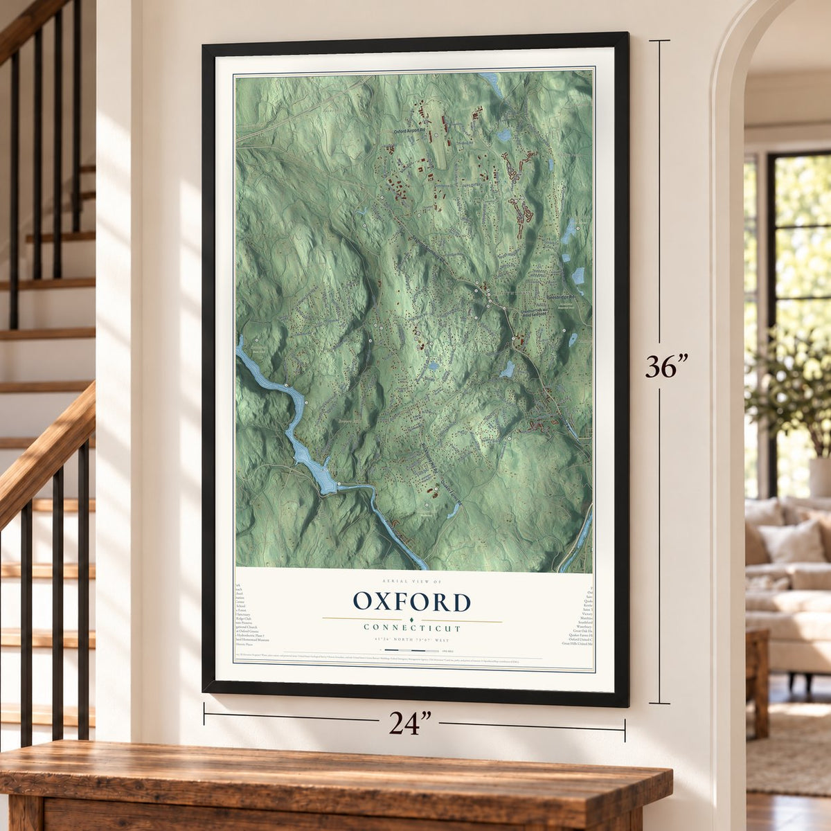 Oxford, Connecticut map, 24 x 36 inch print in a black frame by a staircase