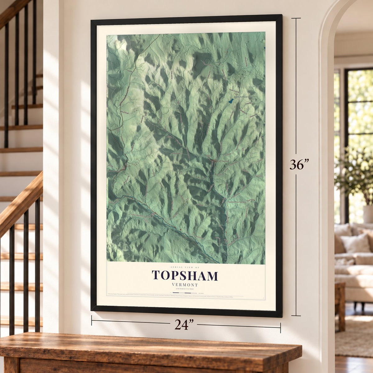 Topsham, Vermont map, 24 x 36 inch print in a black frame by a staircase