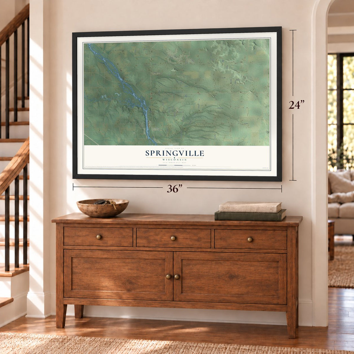 Springville, Wisconsin map, 24 x 36 inch print in a black frame above a dresser by a staircase