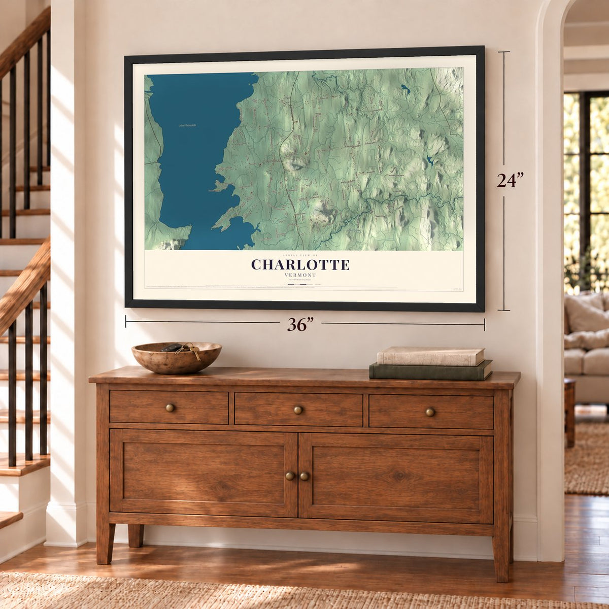 Charlotte, Vermont map, 24 x 36 inch print in a black frame above a dresser by a staircase