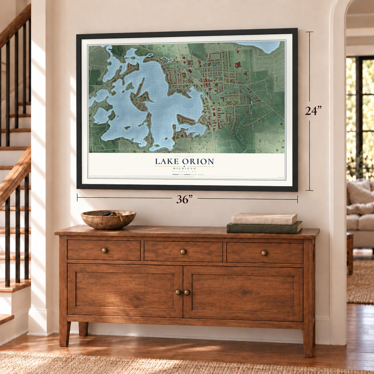 Lake Orion, Michigan map, 24 x 36 inch print in a black frame above a dresser by a staircase