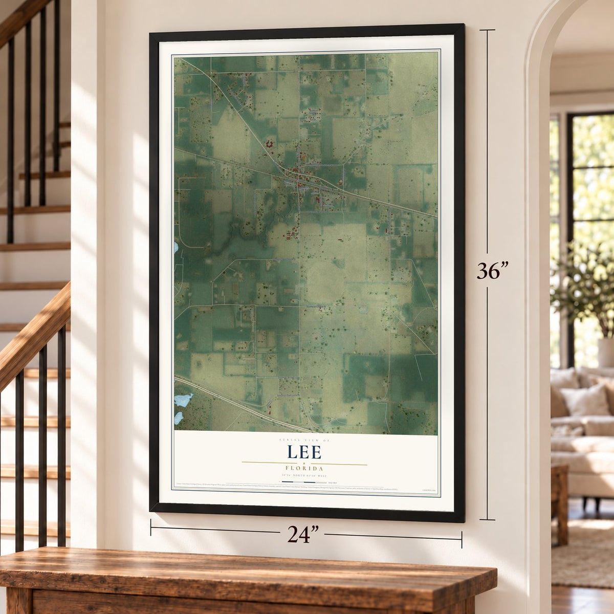 Lee, Florida map, 24 x 36 inch print in a black frame by a staircase
