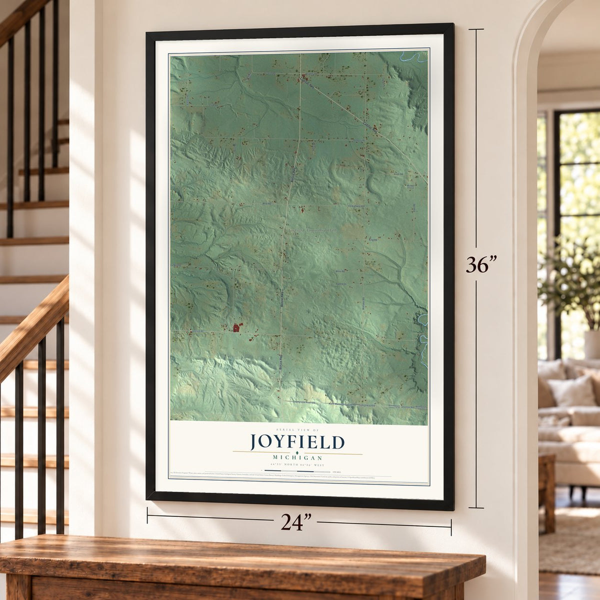 Joyfield, Michigan map, 24 x 36 inch print in a black frame by a staircase
