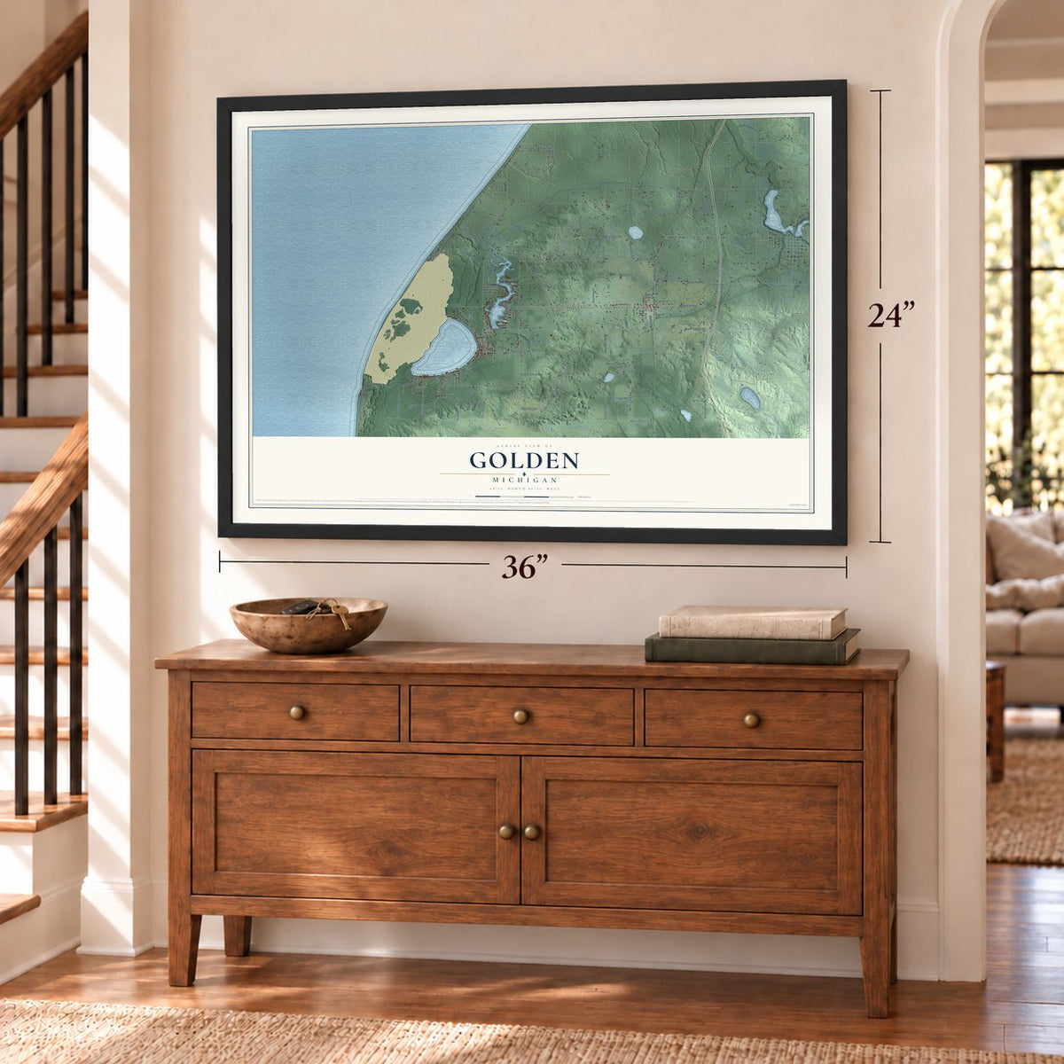 Golden, Michigan map, 24 x 36 inch print in a black frame above a dresser by a staircase