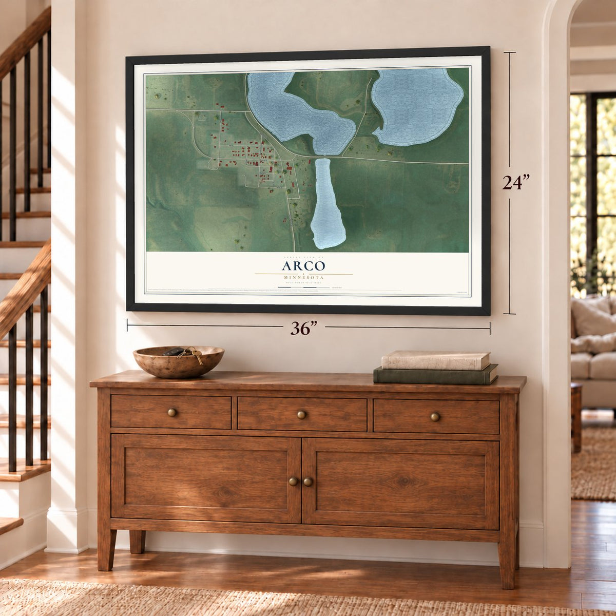 Arco, Minnesota map, 24 x 36 inch print in a black frame above a dresser by a staircase