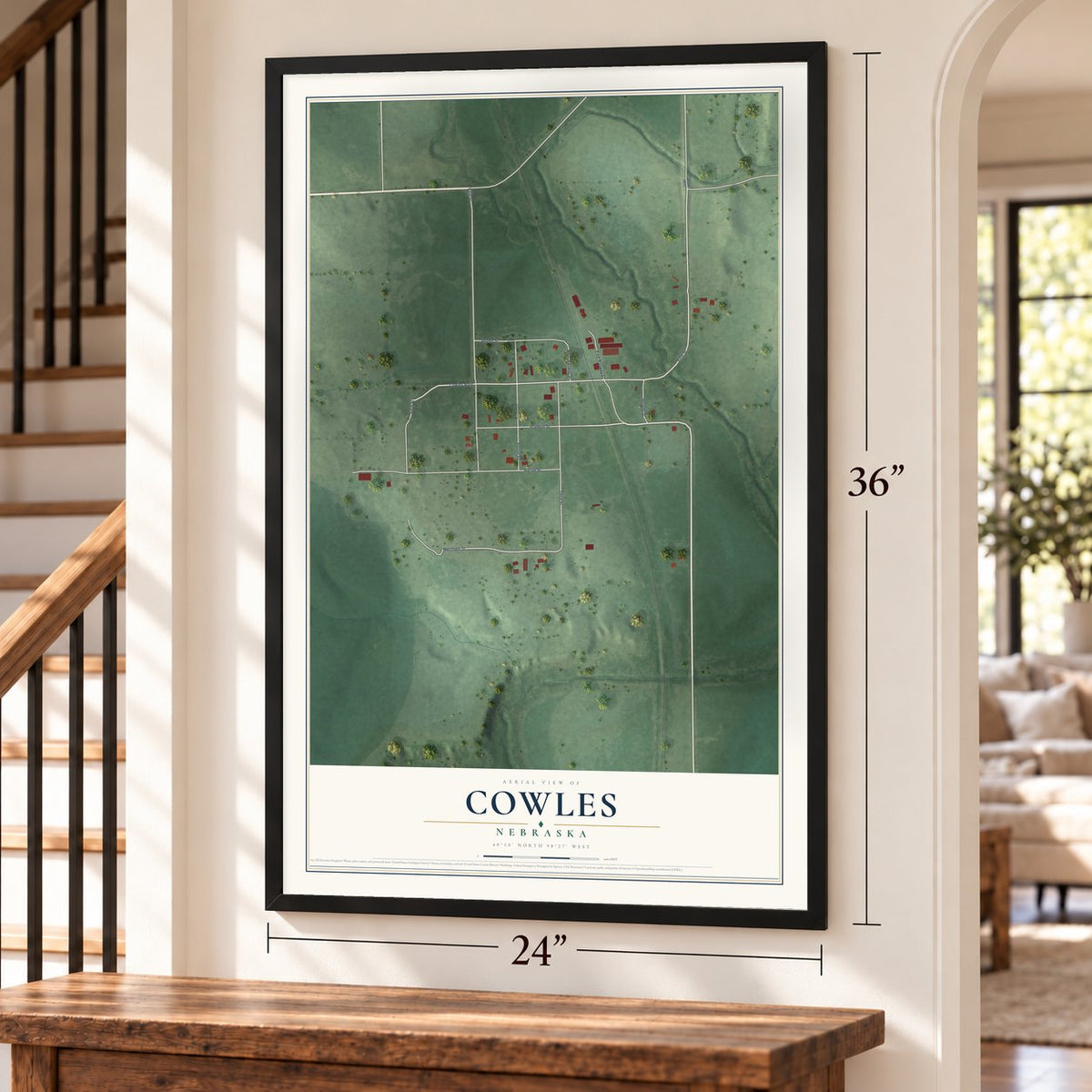 Cowles, Nebraska map, 24 x 36 inch print in a black frame by a staircase