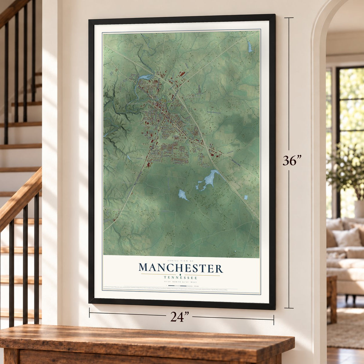 Manchester, Tennessee map, 24 x 36 inch print in a black frame by a staircase