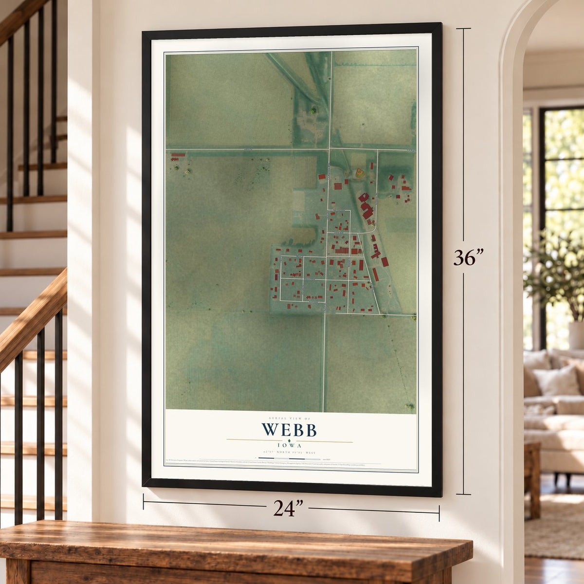 Webb, Iowa map, 24 x 36 inch print in a black frame by a staircase