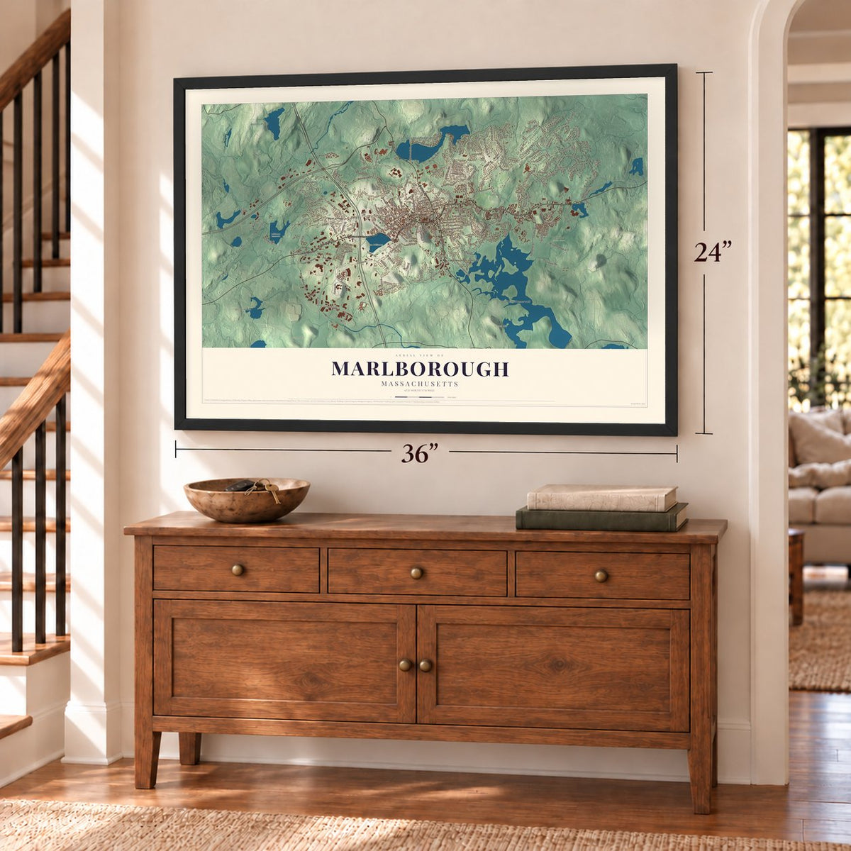 Marlborough, Massachusetts map, 24 x 36 inch print in a black frame above a dresser by a staircase
