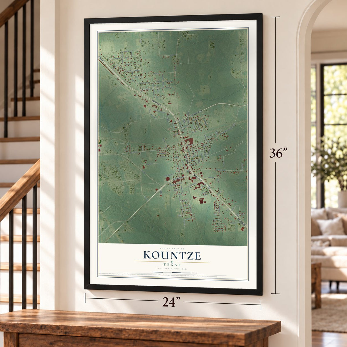 Kountze, Texas map, 24 x 36 inch print in a black frame by a staircase
