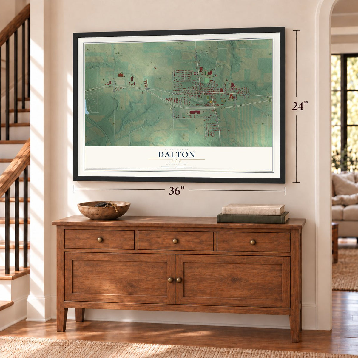 Dalton, Ohio map, 24 x 36 inch print in a black frame above a dresser by a staircase