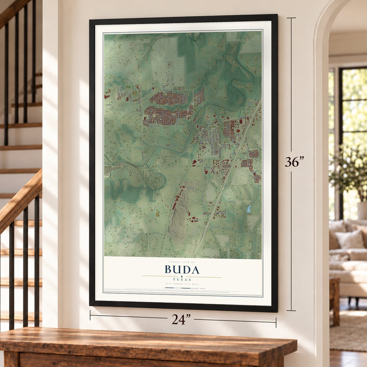 Buda, Texas map, 24 x 36 inch print in a black frame by a staircase