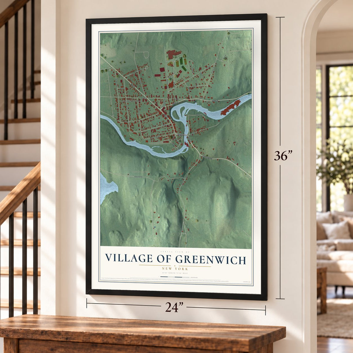 Village of Greenwich, New York map, 24 x 36 inch print in a black frame by a staircase