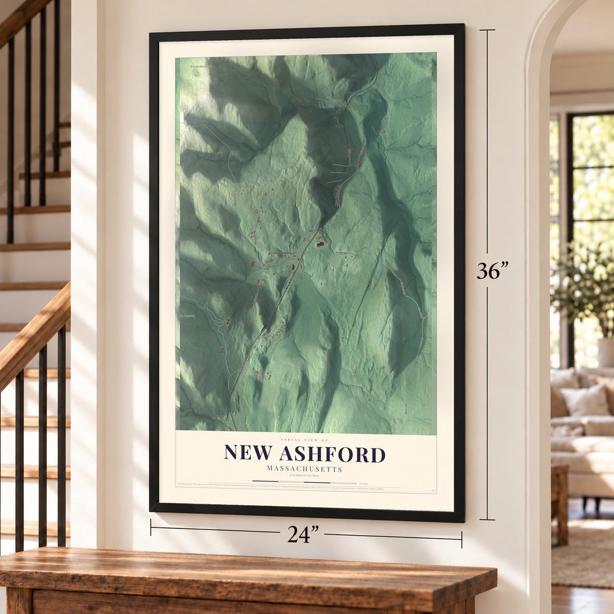 New Ashford, Massachusetts map, 24 x 36 inch print in a black frame by a staircase