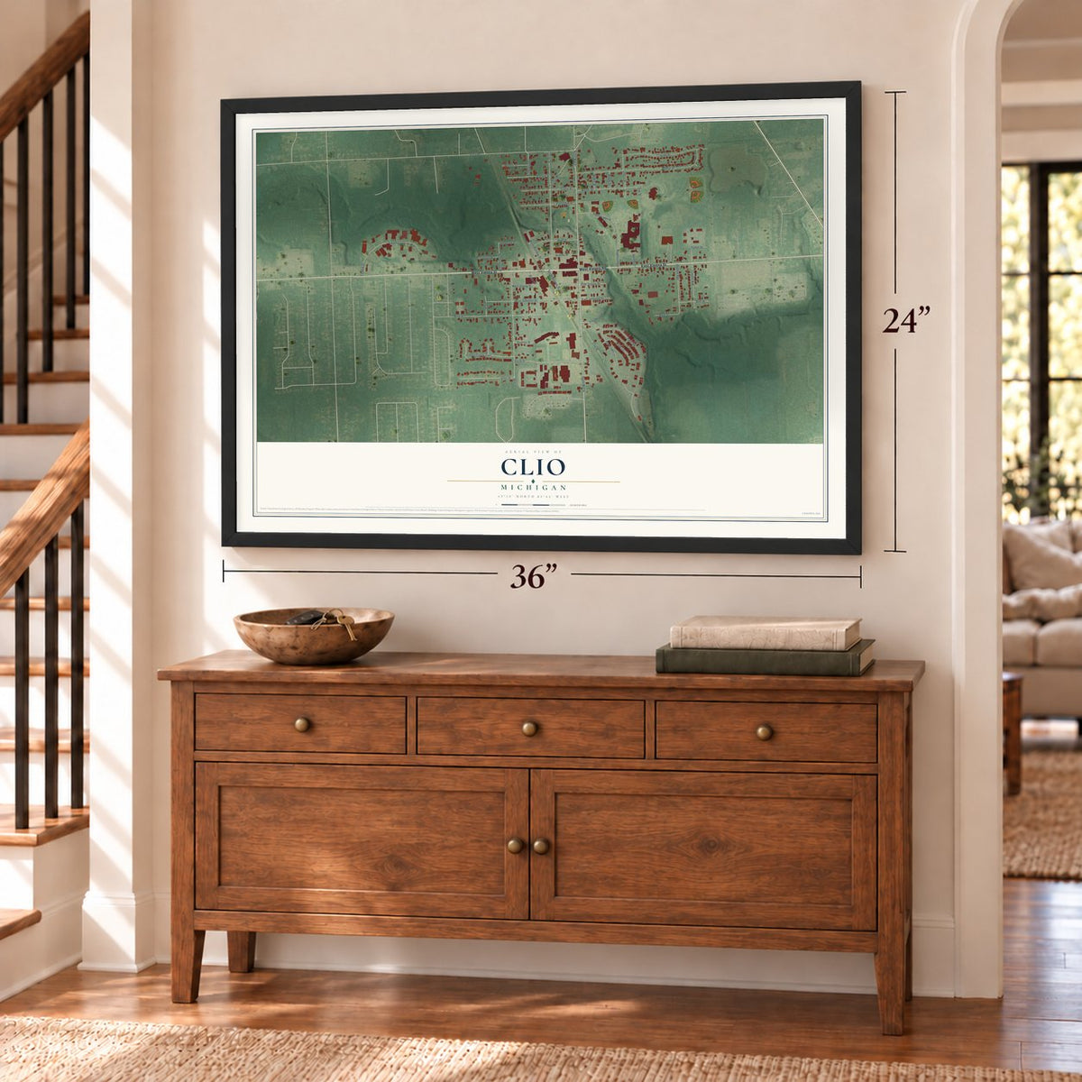 Clio, Michigan map, 24 x 36 inch print in a black frame above a dresser by a staircase