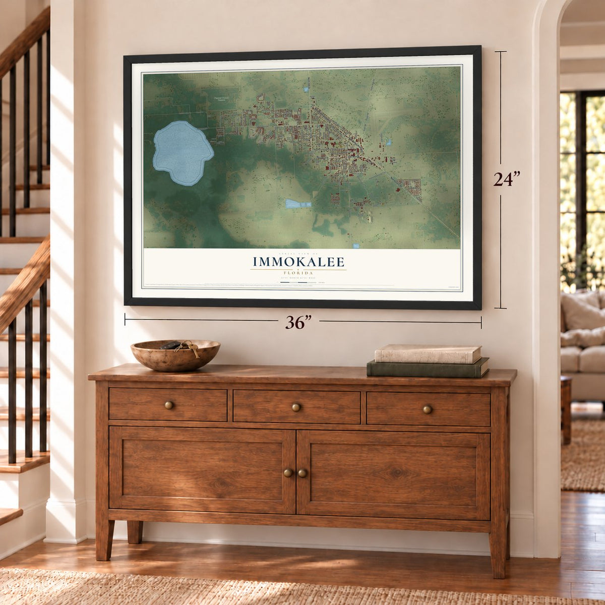 Immokalee, Florida map, 24 x 36 inch print in a black frame above a dresser by a staircase