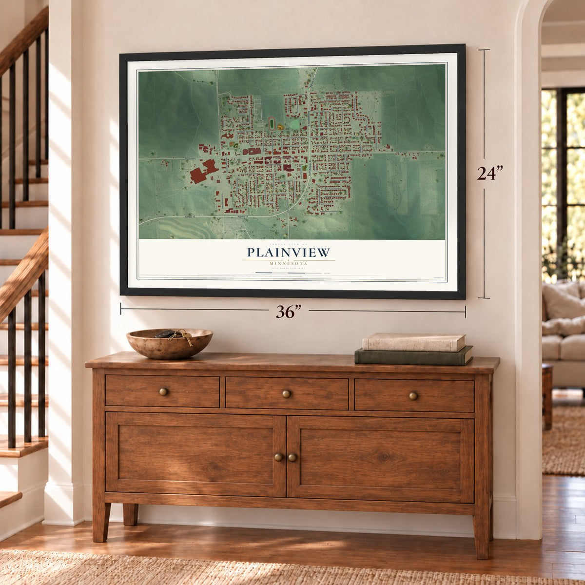 Plainview, Minnesota map, 24 x 36 inch print in a black frame above a dresser by a staircase
