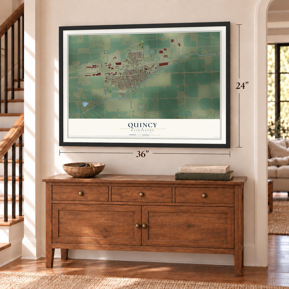 Quincy, Washington map, 24 x 36 inch print in a black frame above a dresser by a staircase