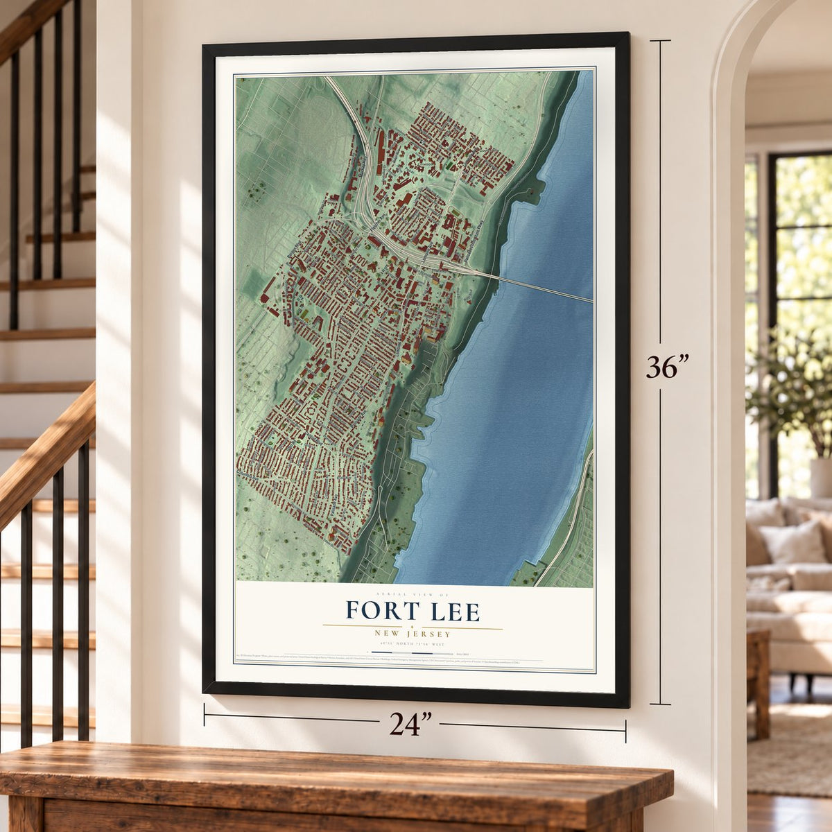Fort Lee, New Jersey map, 24 x 36 inch print in a black frame by a staircase