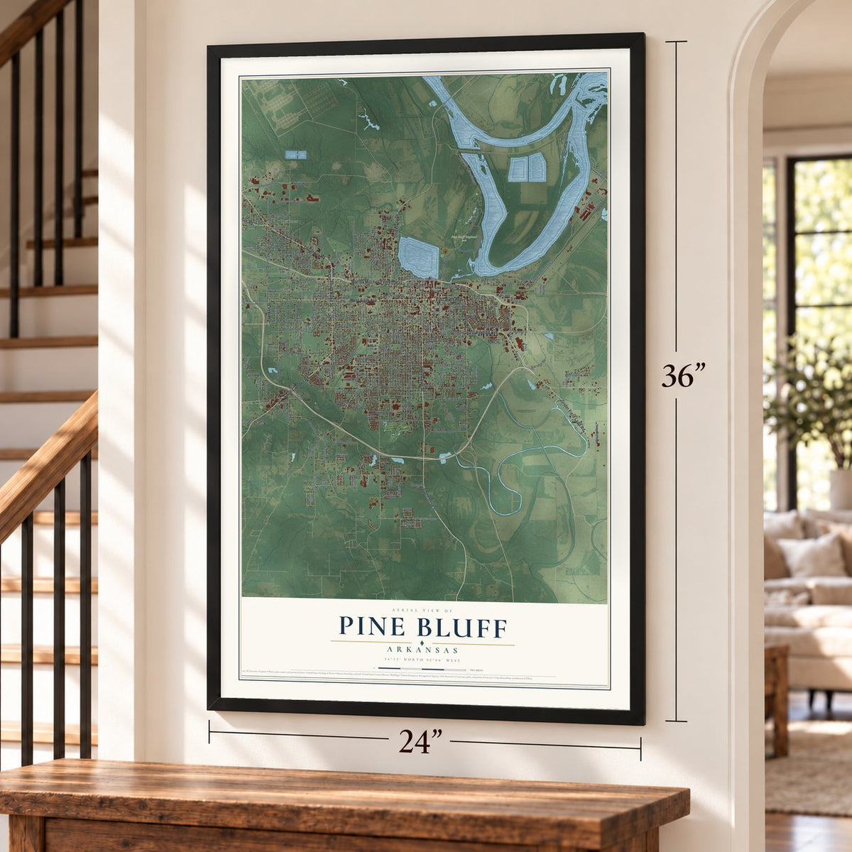 Pine Bluff, Arkansas map, 24 x 36 inch print in a black frame by a staircase
