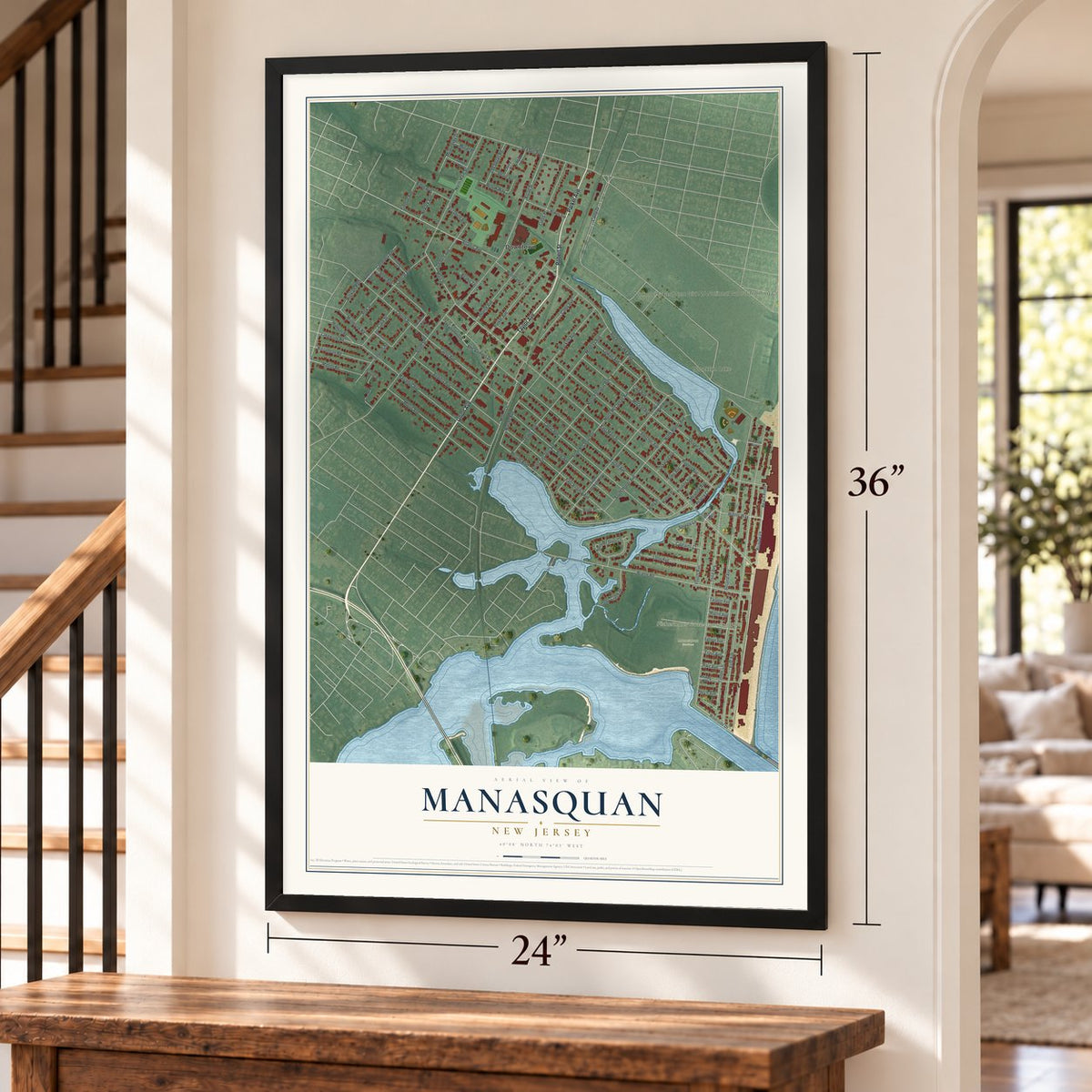 Manasquan, New Jersey map, 24 x 36 inch print in a black frame by a staircase