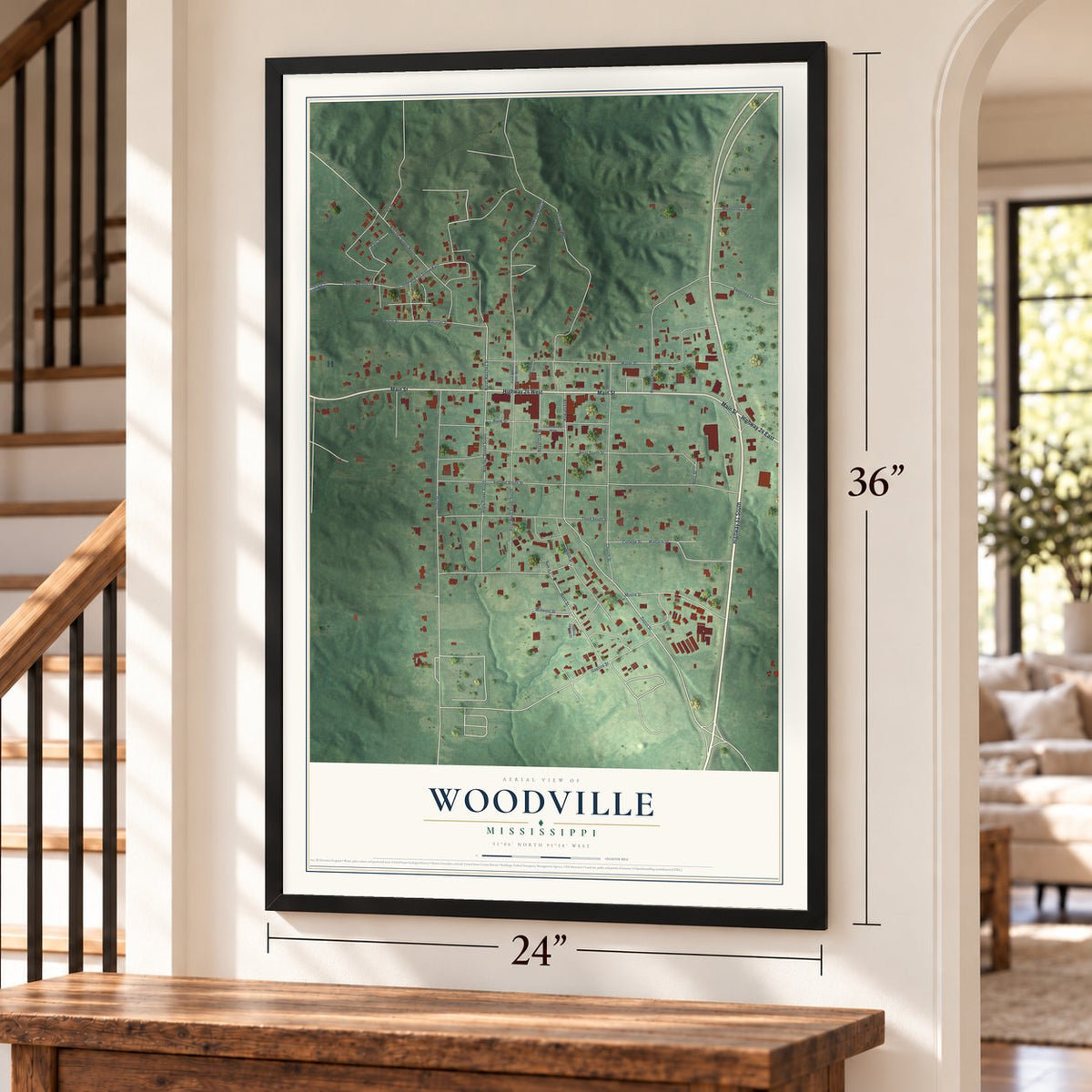 Woodville, Mississippi map, 24 x 36 inch print in a black frame by a staircase