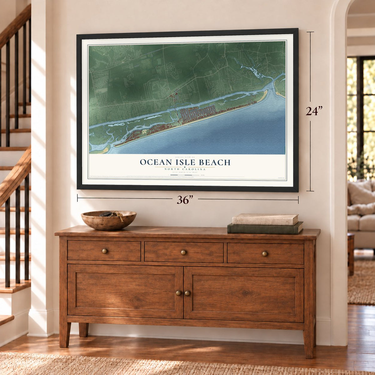Ocean Isle Beach, North Carolina map, 24 x 36 inch print in a black frame above a dresser by a staircase