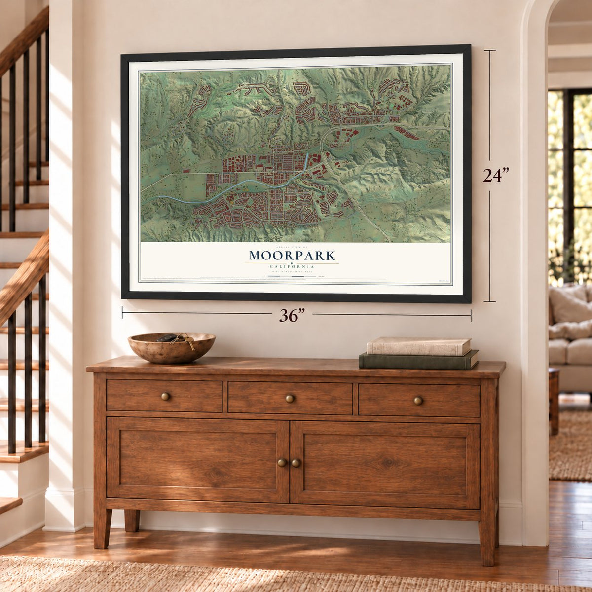 Moorpark, California map, 24 x 36 inch print in a black frame above a dresser by a staircase