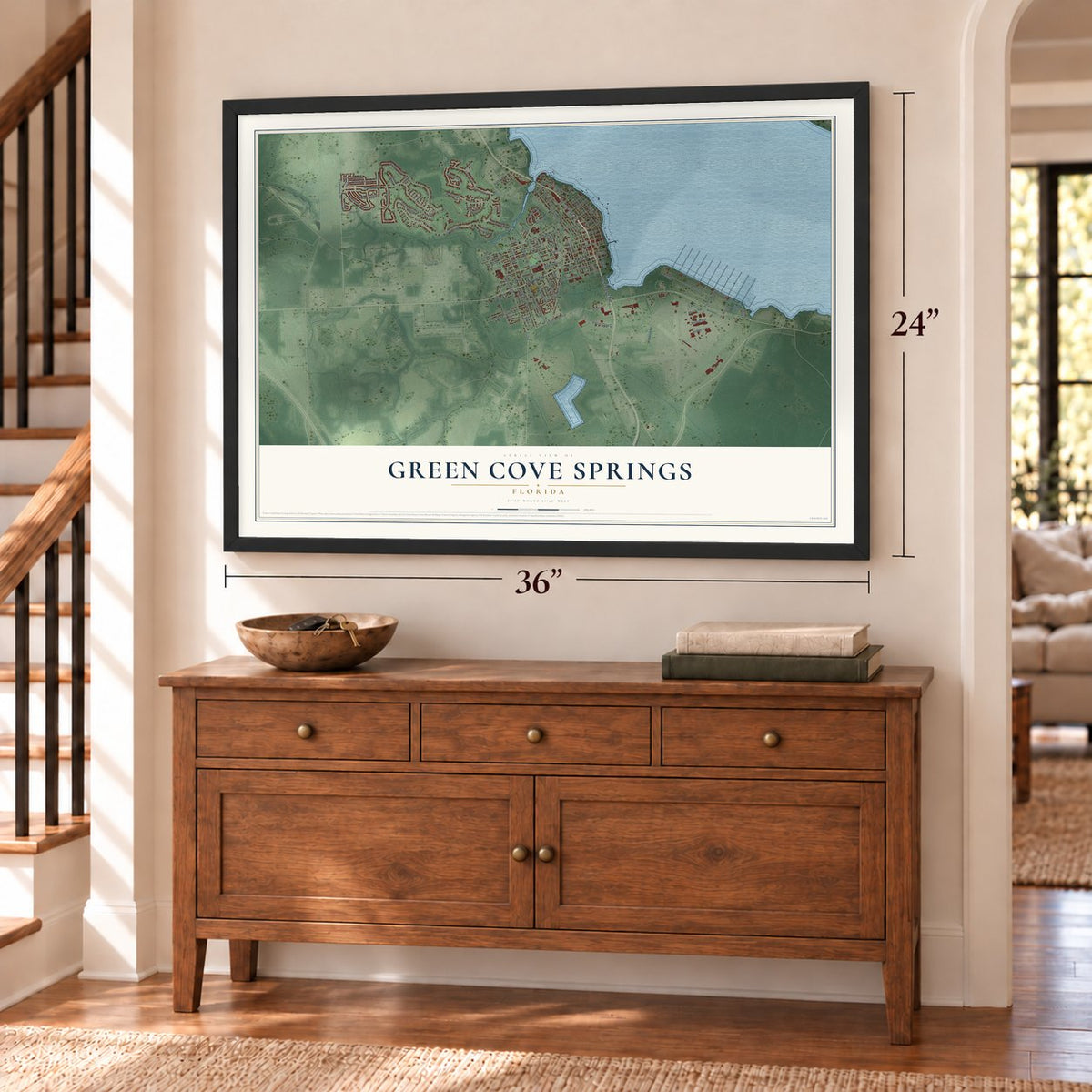 Green Cove Springs, Florida map, 24 x 36 inch print in a black frame above a dresser by a staircase
