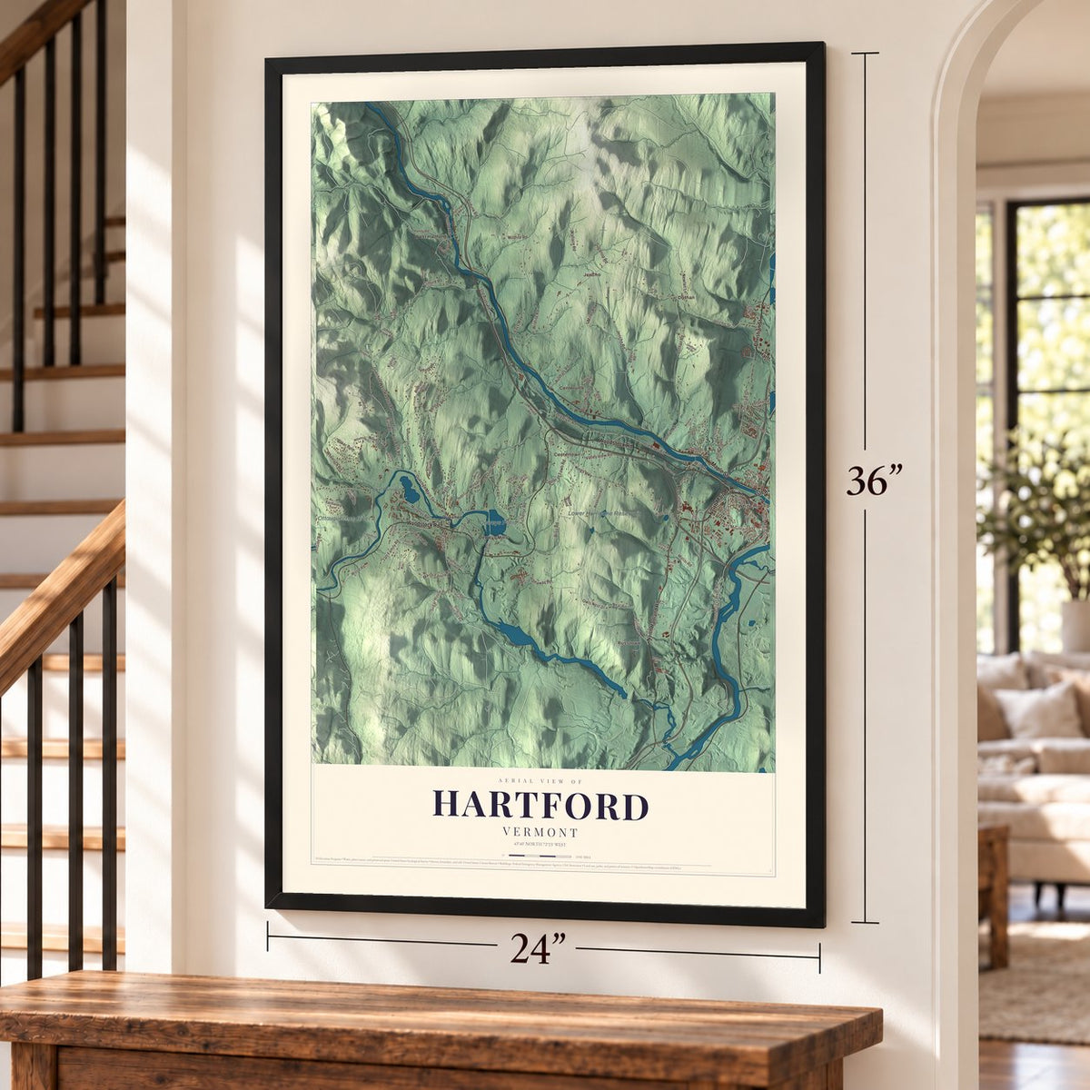 Hartford, Vermont map, 24 x 36 inch print in a black frame by a staircase