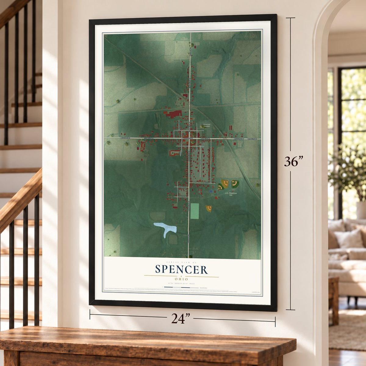 Spencer, Ohio map, 24 x 36 inch print in a black frame by a staircase