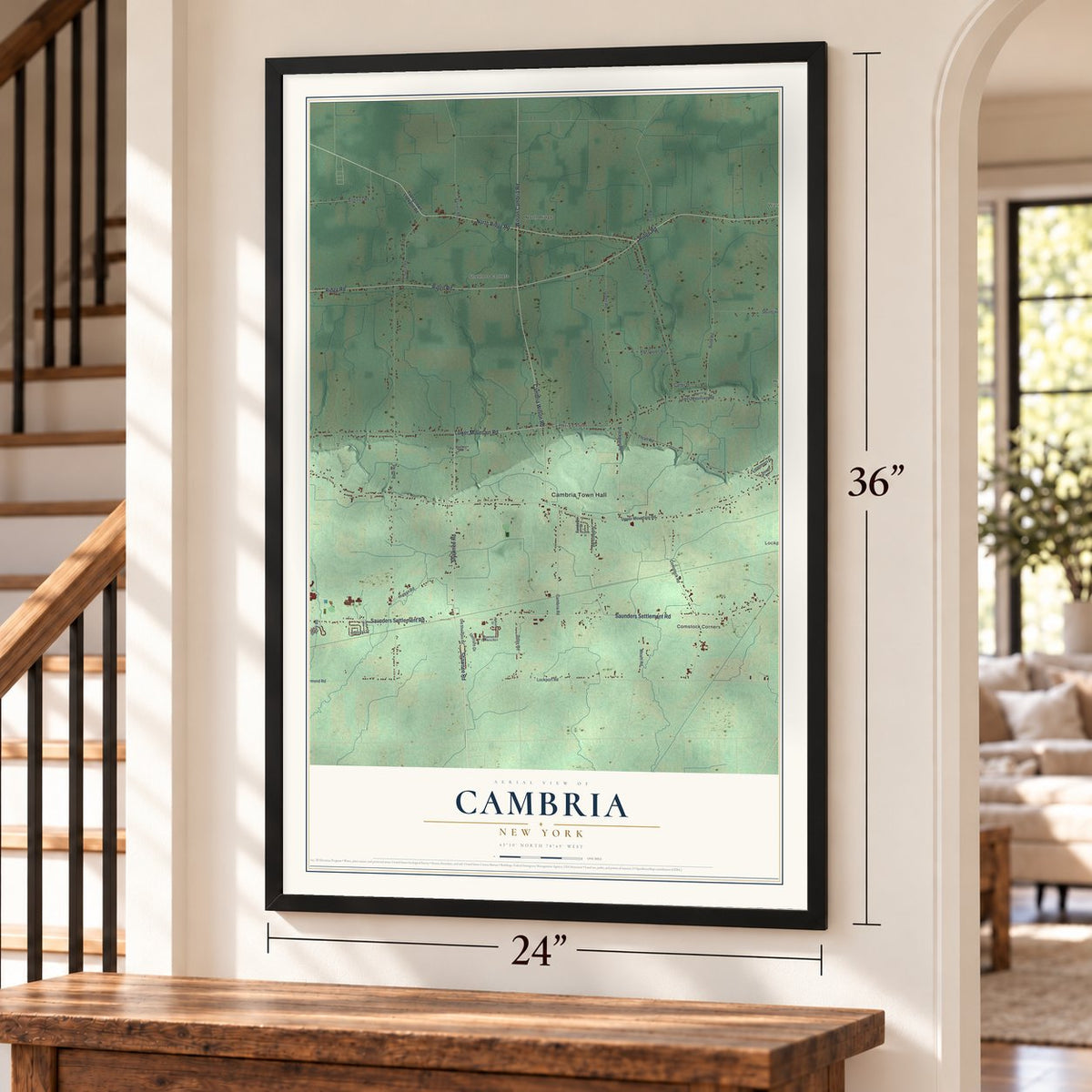 Cambria, New York map, 24 x 36 inch print in a black frame by a staircase