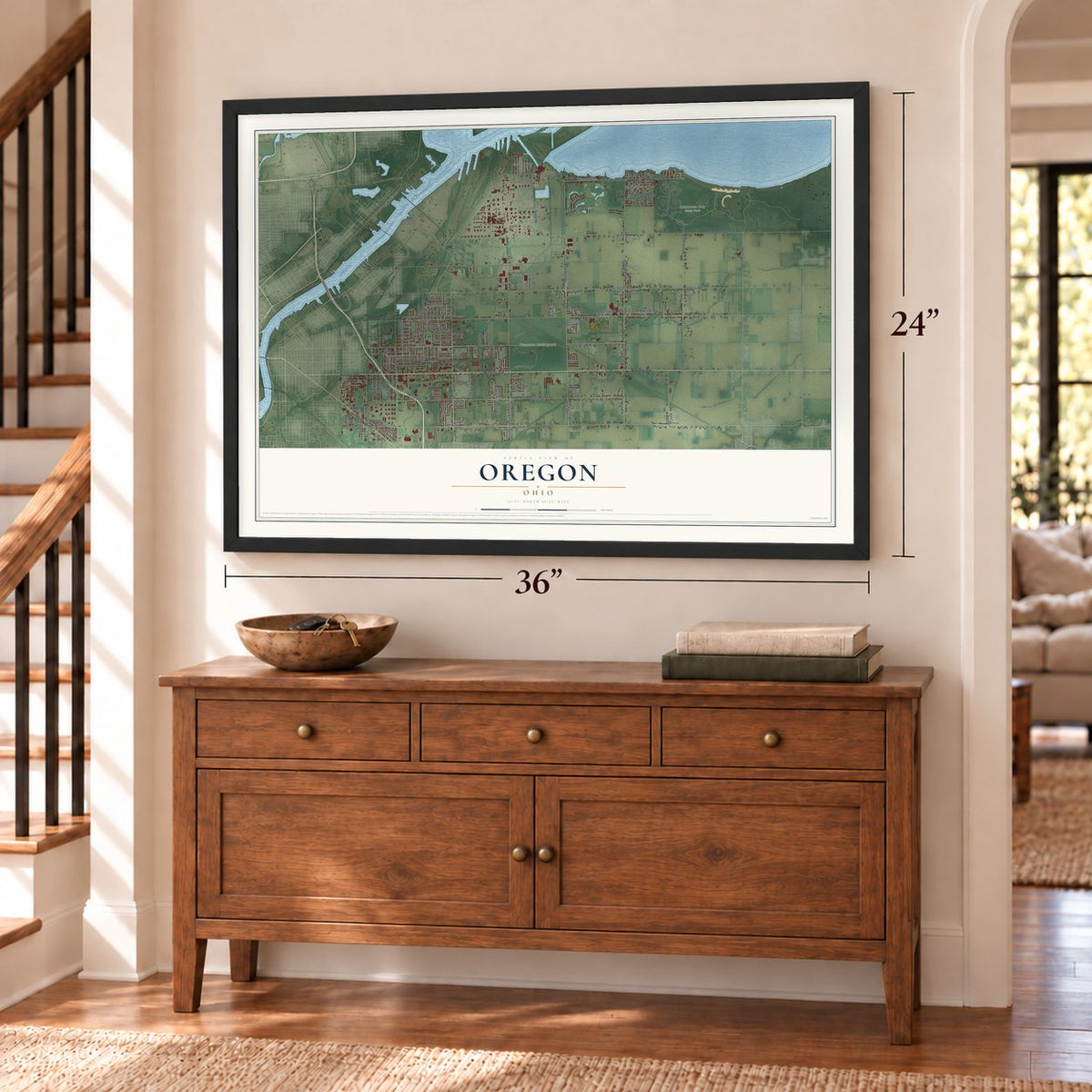 Oregon, Ohio map, 24 x 36 inch print in a black frame above a dresser by a staircase
