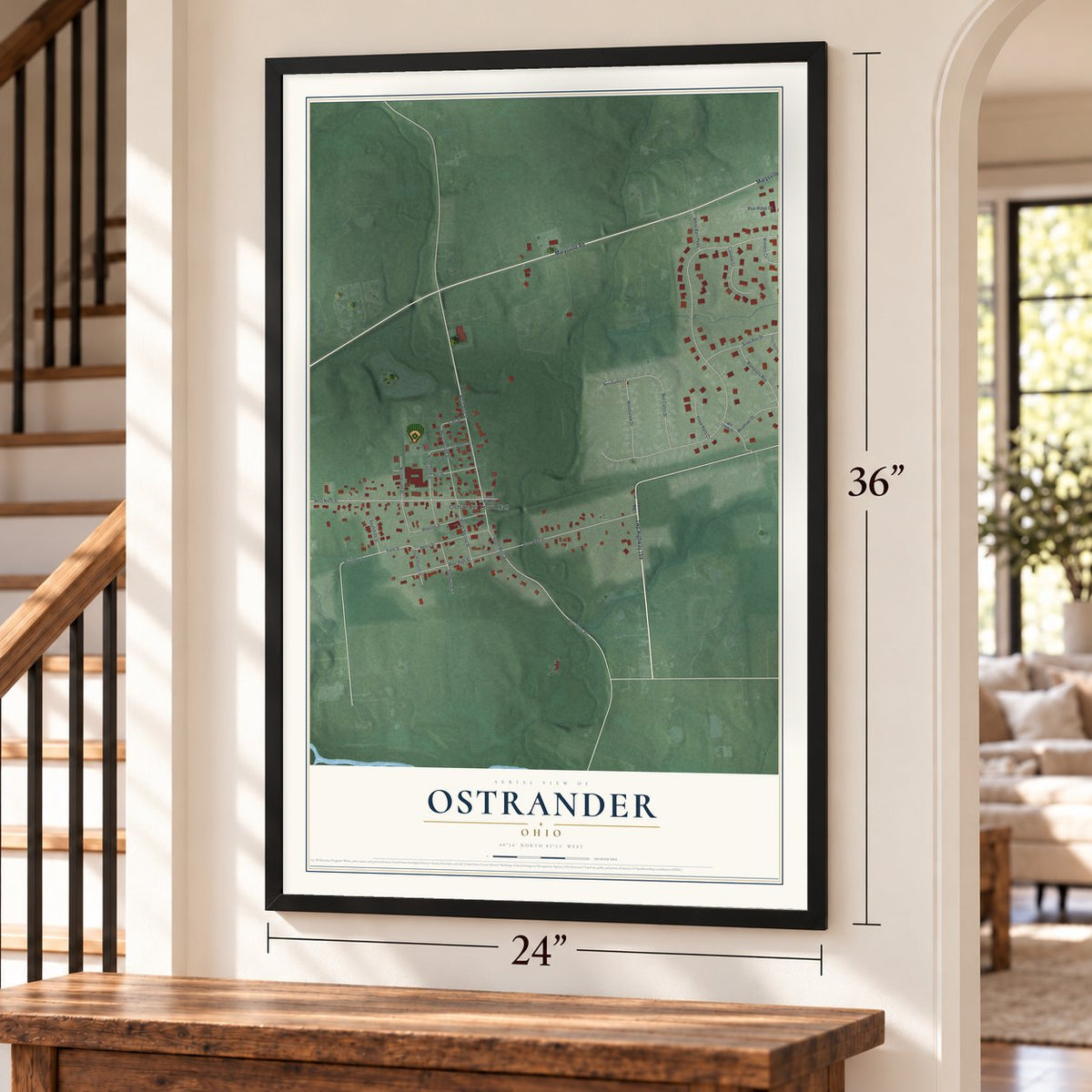 Ostrander, Ohio map, 24 x 36 inch print in a black frame by a staircase