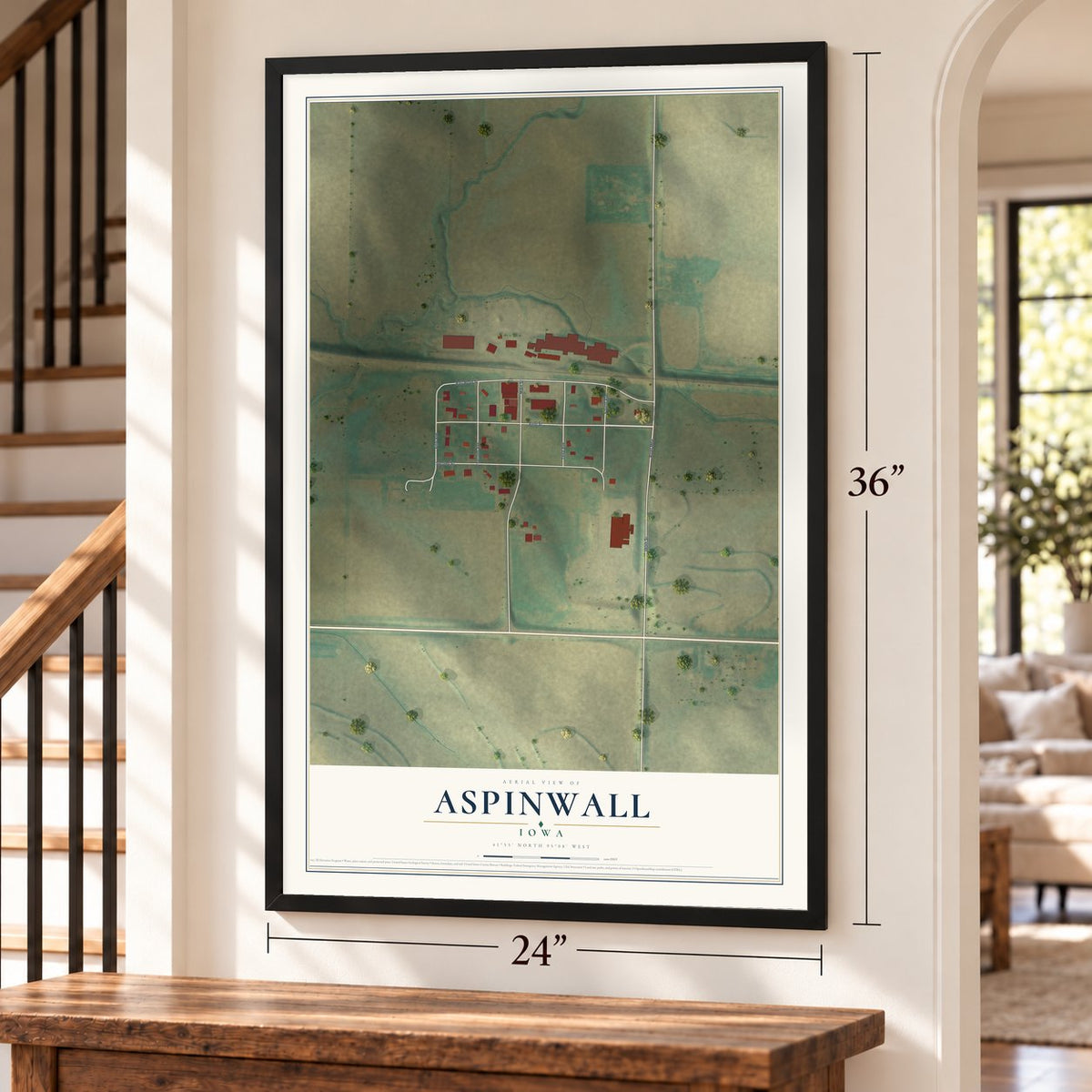 Aspinwall, Iowa map, 24 x 36 inch print in a black frame by a staircase