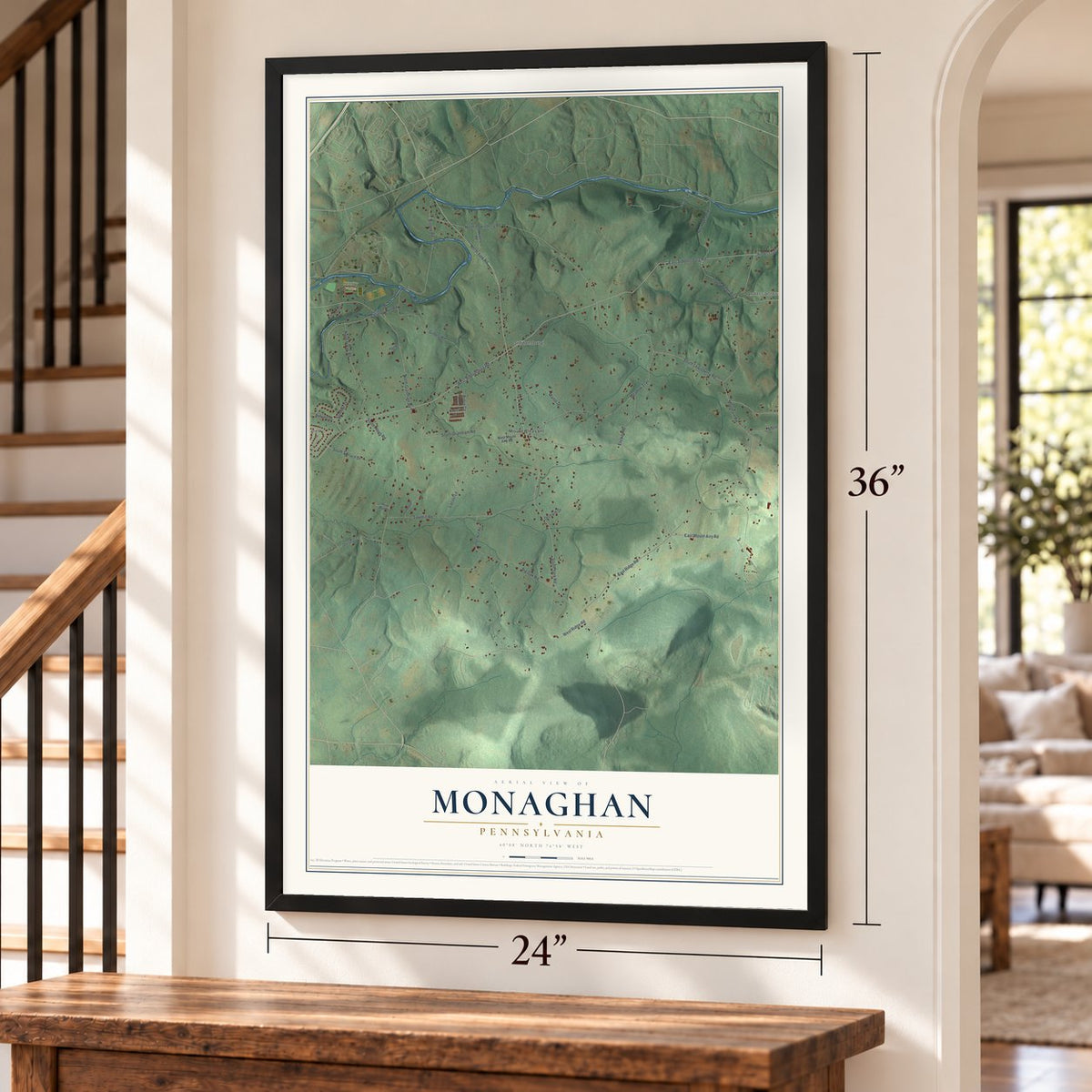 Monaghan, Pennsylvania map, 24 x 36 inch print in a black frame by a staircase