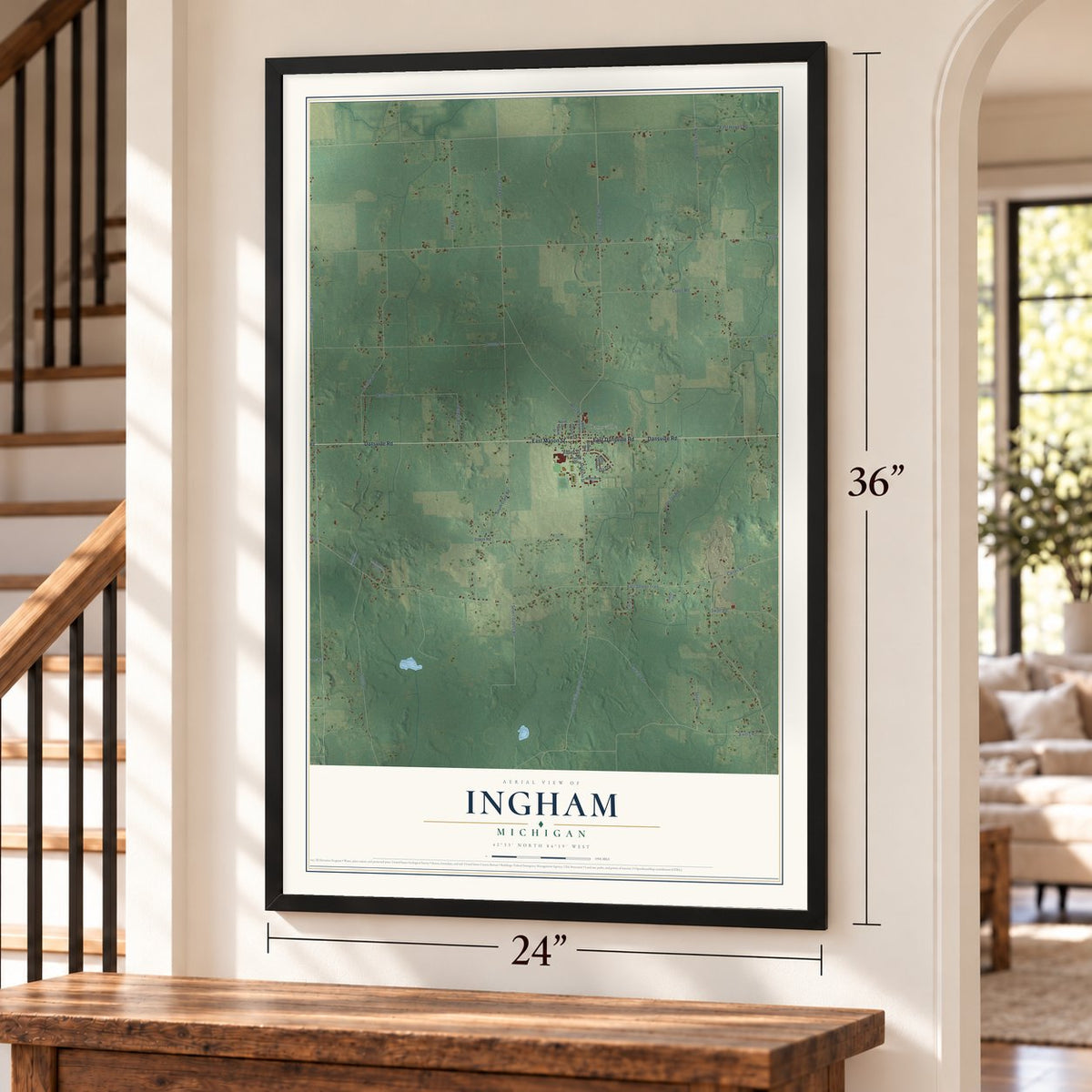 Ingham, Michigan map, 24 x 36 inch print in a black frame by a staircase