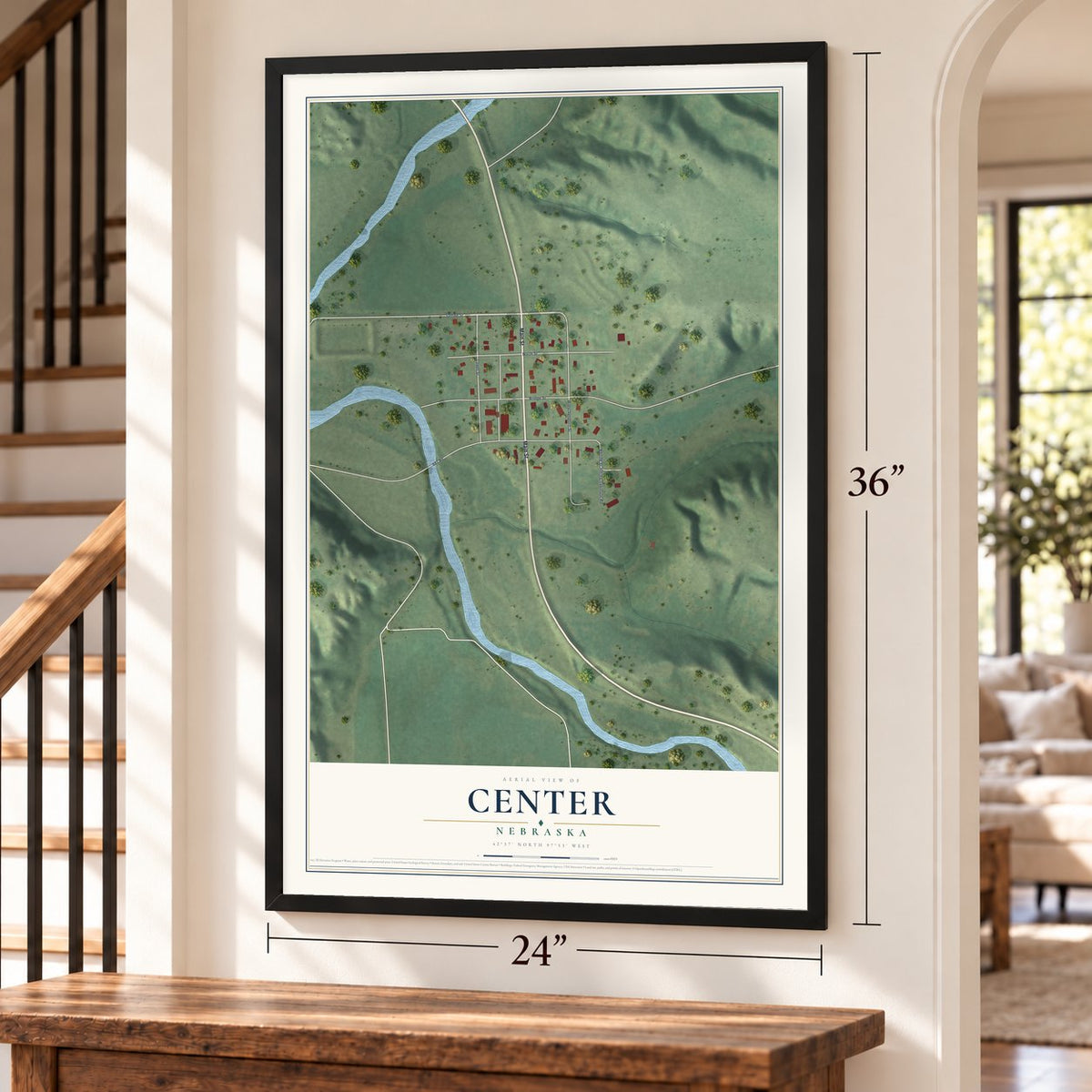 Center, Nebraska map, 24 x 36 inch print in a black frame by a staircase