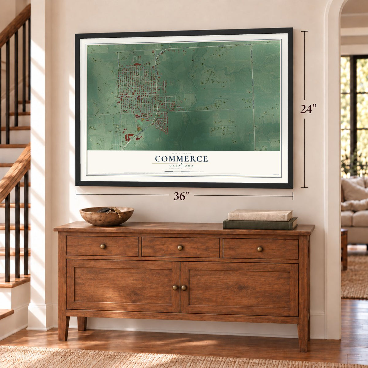 Commerce, Oklahoma map, 24 x 36 inch print in a black frame above a dresser by a staircase