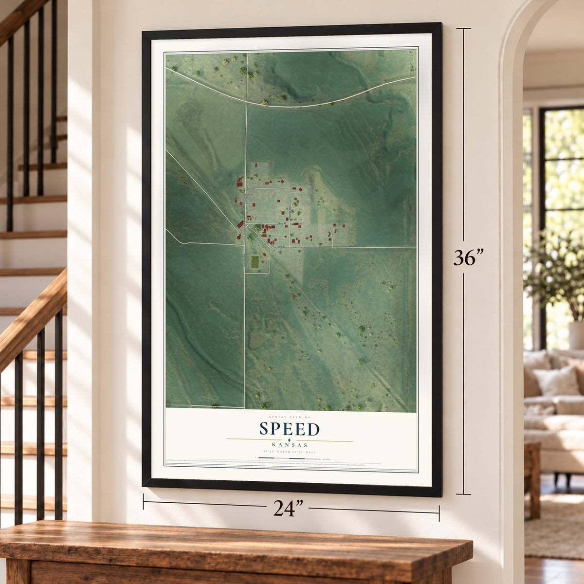 Speed, Kansas map, 24 x 36 inch print in a black frame by a staircase